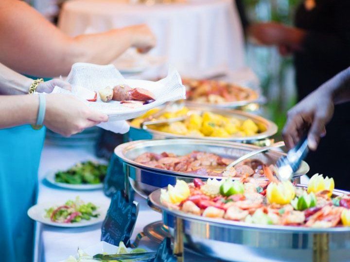 Wedding Buffet Server assisted wedding buffet of a fine Florida Keys Seafood boil, Paella and Keylime Tartlets for dessert.
