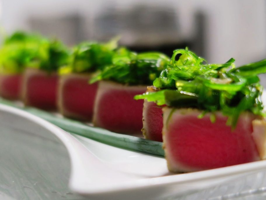 Ahi Tuna topped with Seaweed salad, drizzled with Keylime ponzu. 